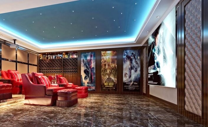 A luxurious home theater design featuring top-notch decor, comfortable seating, and high-end audiovisuals.